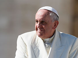 Pope Francis smiles as he leaves his general audience in St. Peter's Square at the Vatican March 5, 2014. CNS photo/Paul Haring