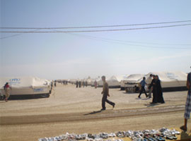 Thousands of Syrian refugees crowd the Zaatari refugee camp in the northern Jordanian desert.  USCCB Photo.