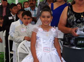 Little girl at Mass for migrants in the Diocese of Youngstown.