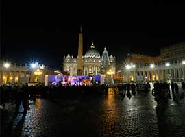 The Christmas tree and Nativity scene decorate St. Peter's Square at the Vatican after a lighting ceremony.  CNS photo/Paul Haring
