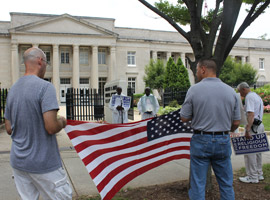 Fortnight 2014 - Flag is displayed during Fortnight 2014 Religious Liberty March to the Charles R. Jonas Federal Courthouse in Charlotte, NC. (Patricia Guilfoyle, Catholic News Herald, Diocese of Charlotte)