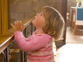 child-praying-in-church-montage