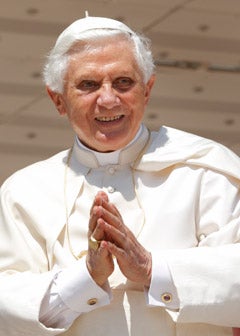 Pope Benedict XVI looks out on pilgrims as he concludes his general audience in St. Peter's Square at the Vatican Aug. 4. Some 53,000 altar servers, most from the pope's native Germany, attended the audience. (CNS photo/Paul Haring) Pope Benedict XVI looks out on pilgrims as he concludes his general audience in St. Peter's Square at the Vatican Aug. 4. Some 53,000 altar servers, most from the pope's native Germany, attended the audience. (CNS photo/Paul Haring)