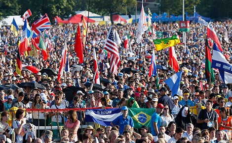 Pilgrims attend the Way of the Cross at World Youth Day in Blonia Park in Krakow, Poland, July 29. (CNS photo/Paul Haring)