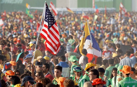 WYD 2011 - Pilgrim carries U.S. flag