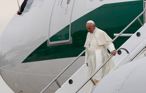 Pope Francis arrives at the international airport in Rio de Janeiro. (CNS photo/Paul Haring)