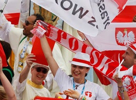 Polish pilgrims cheer as Pope Francis announces that World Youth Day 2016 will take place in Krakow, Poland. (CNS photo/Paul Haring)