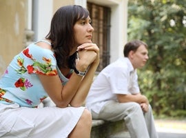 couple-looking-into-distance-on-porch-montage