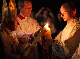 Pope Benedict XVI lights the Pashcal Candle at the Vatican's 2011 Easter Vigil. CNS Photo/Paul Haring