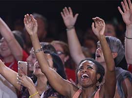 Young people sing along with musician Matt Maher at the 2017 Convocation of Catholic Leaders. CNS Photo/Bob Rolley