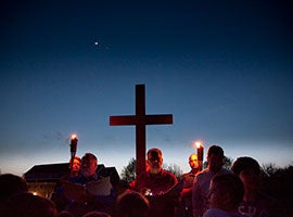 People participate in outdoor Stations of the Cross  at Our Lady of Providence Church in Crestwood, Mo. CNS photo/Lisa Johnston, St. Louis Review