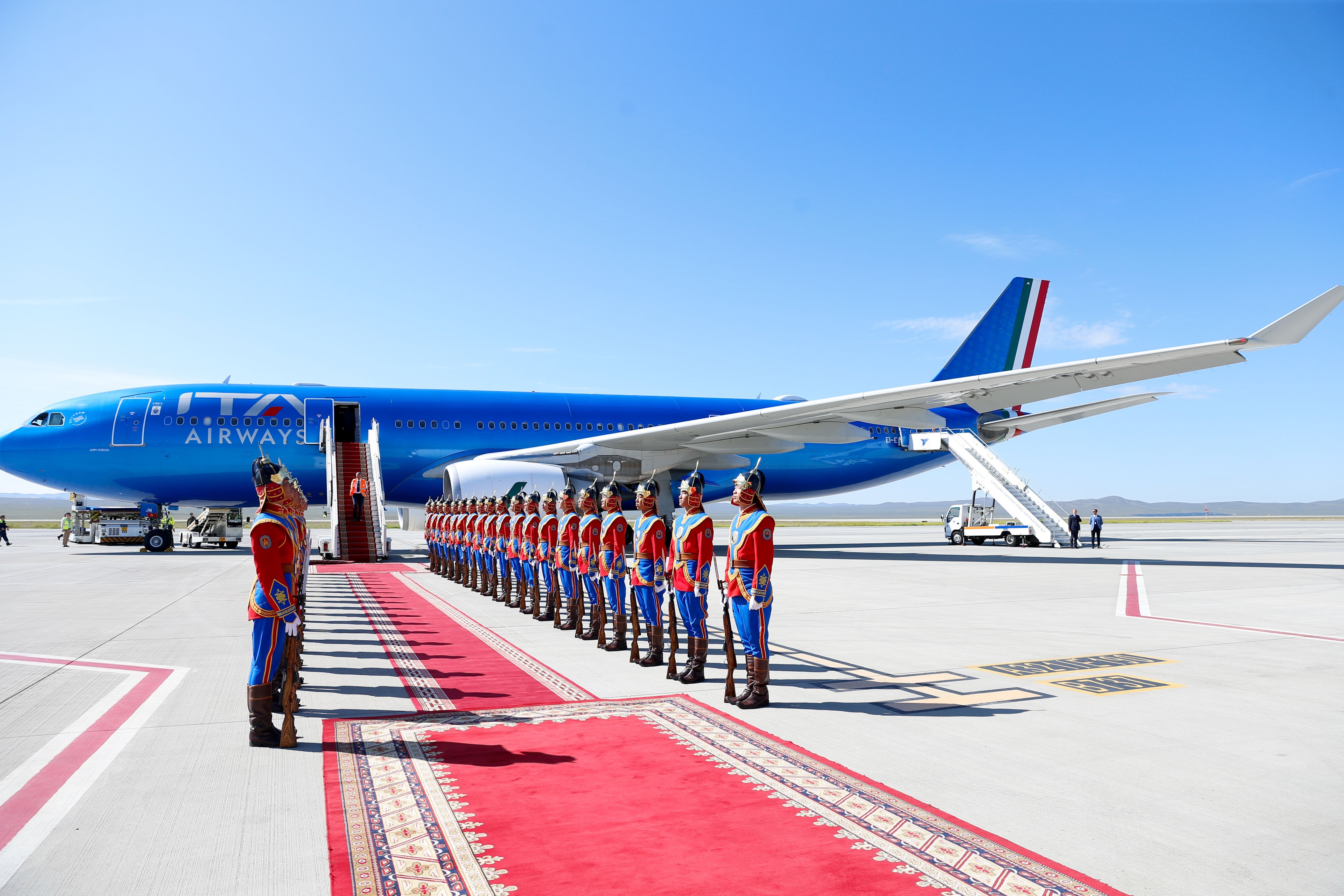 Mongolian honor guard prepares for Pope Francis' farewell ceremony.