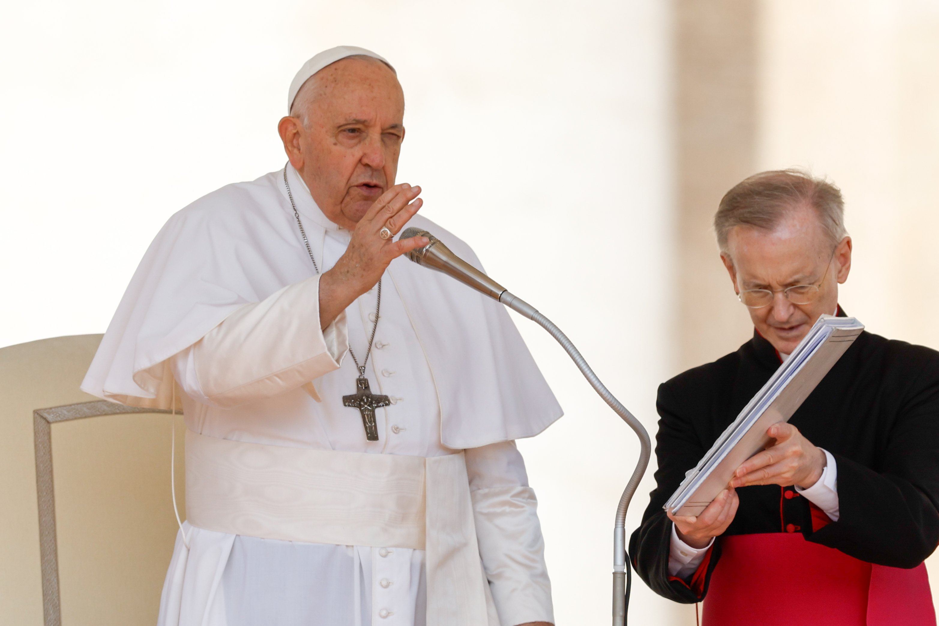 Pope Francis gives a blessing.