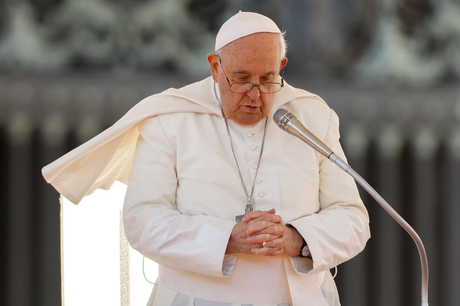 Pope Francis prays