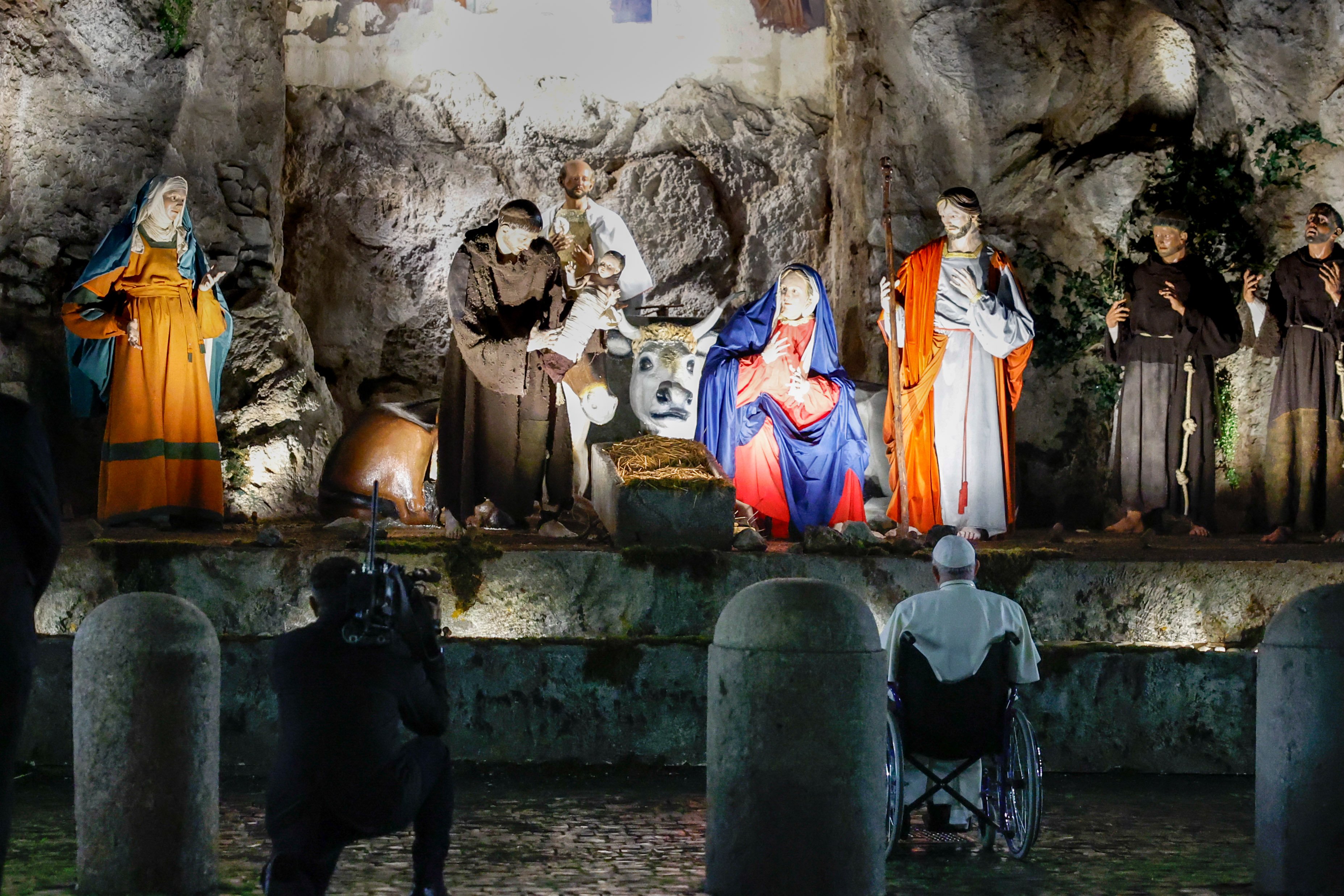 Pope Francis visits the Nativity scene in St. Peter's Square.