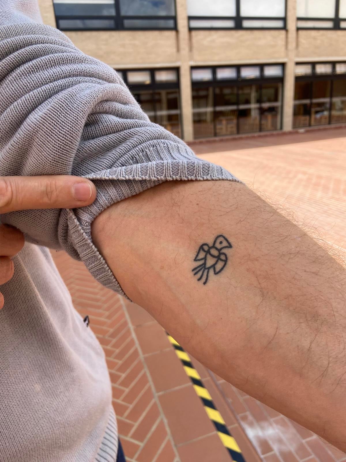 Jesuit Father Gustavo Morello's tattoo