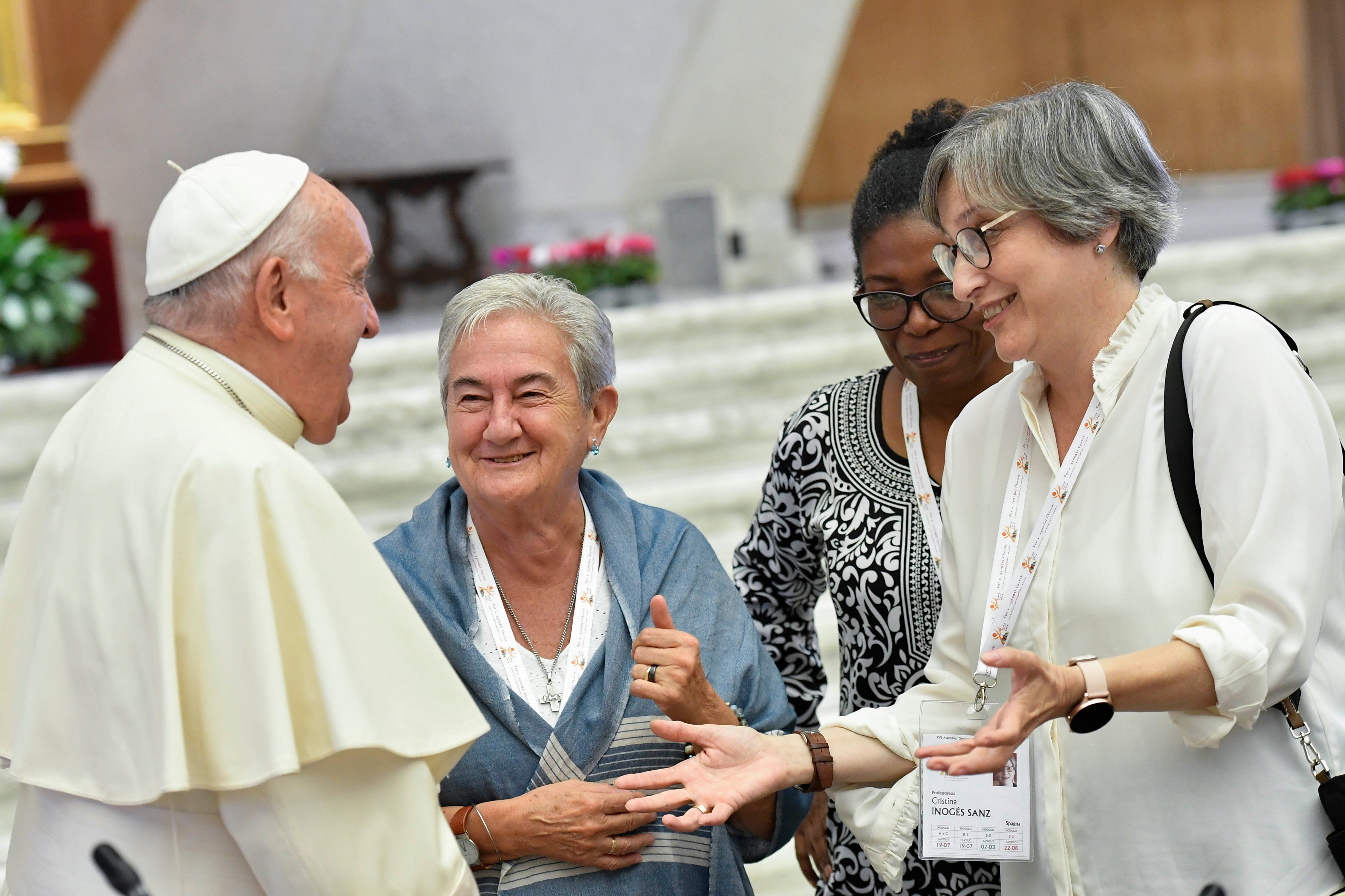 Pope Francis with women at synod