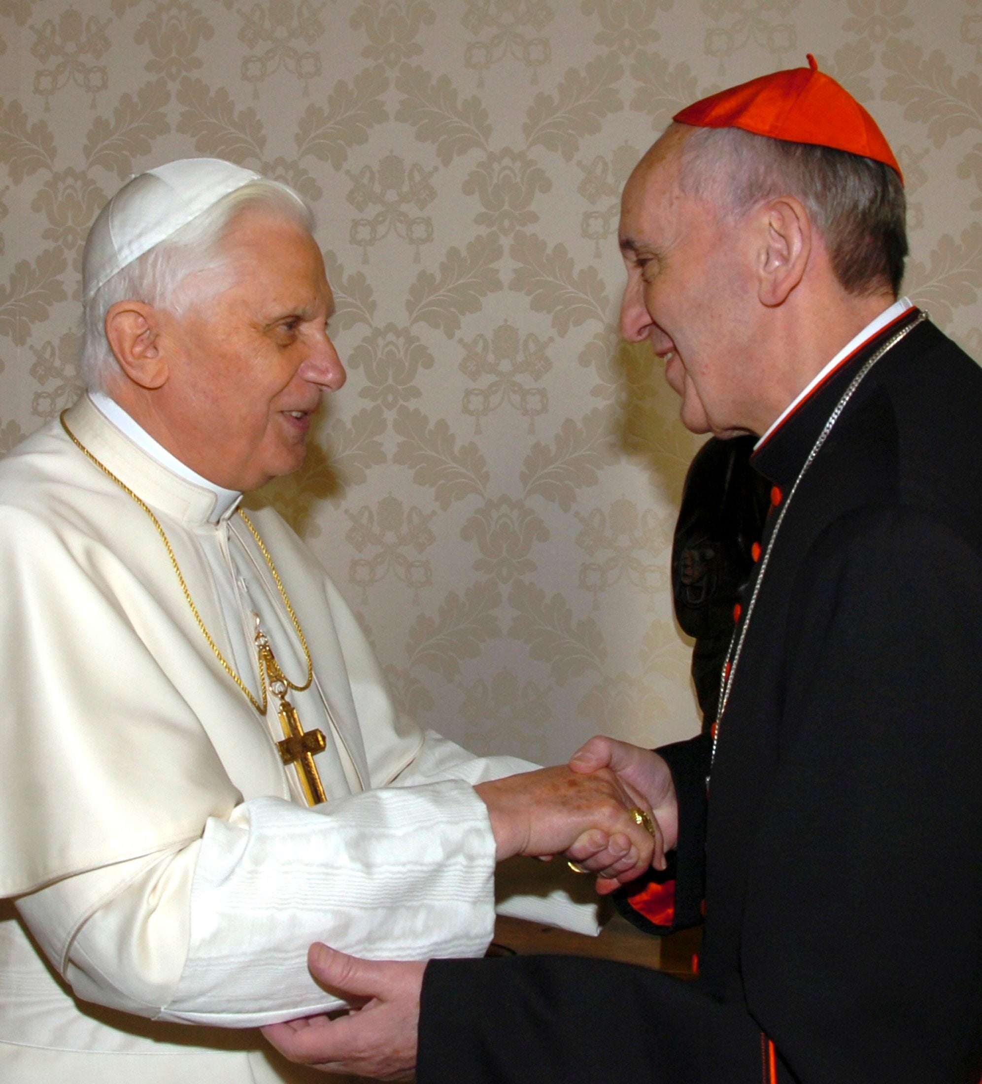 Pope Benedict XVI greets Cardinal Jorge Mario Bergoglio.