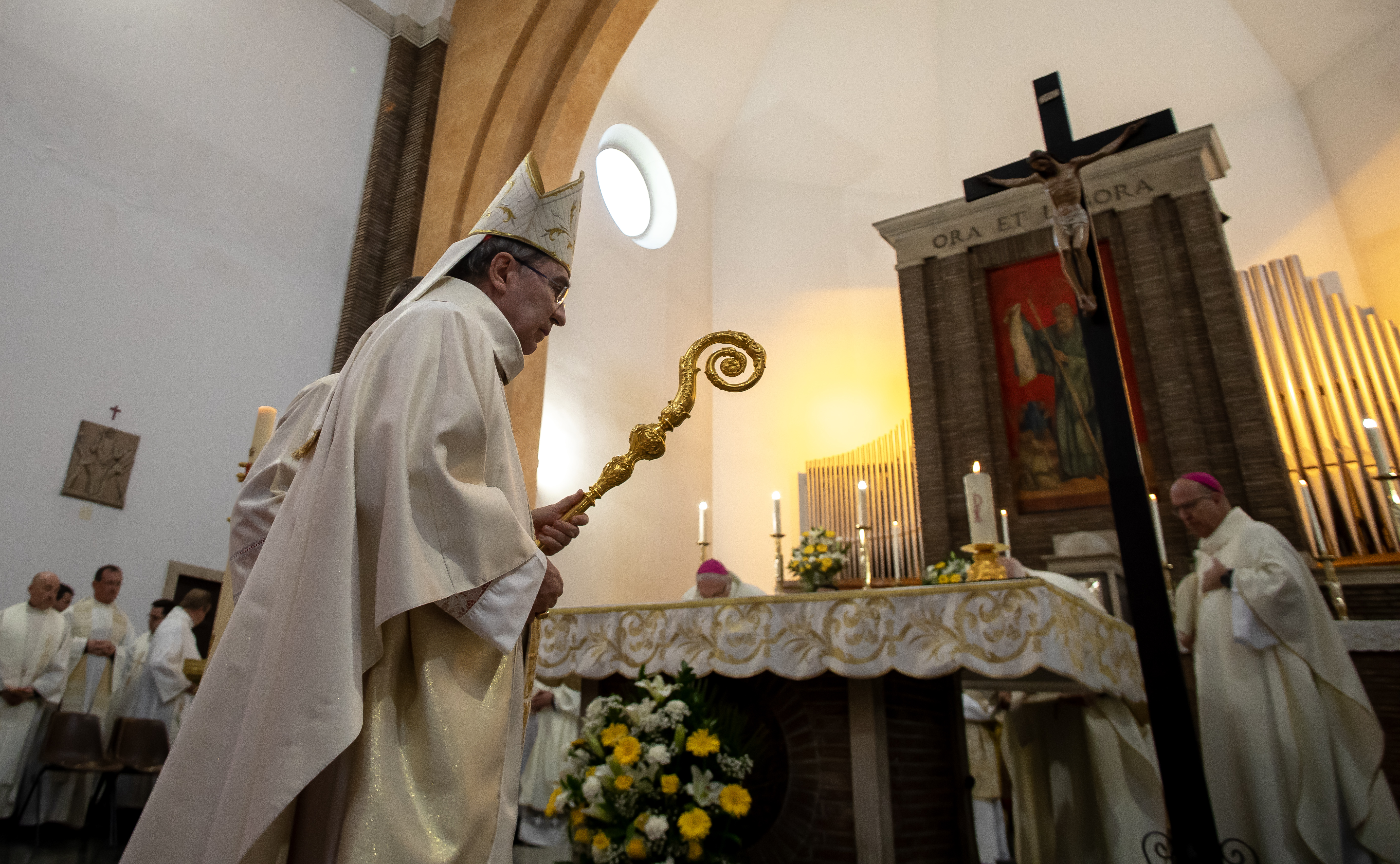 Cardinal Christophe Pierre processes into Mass.