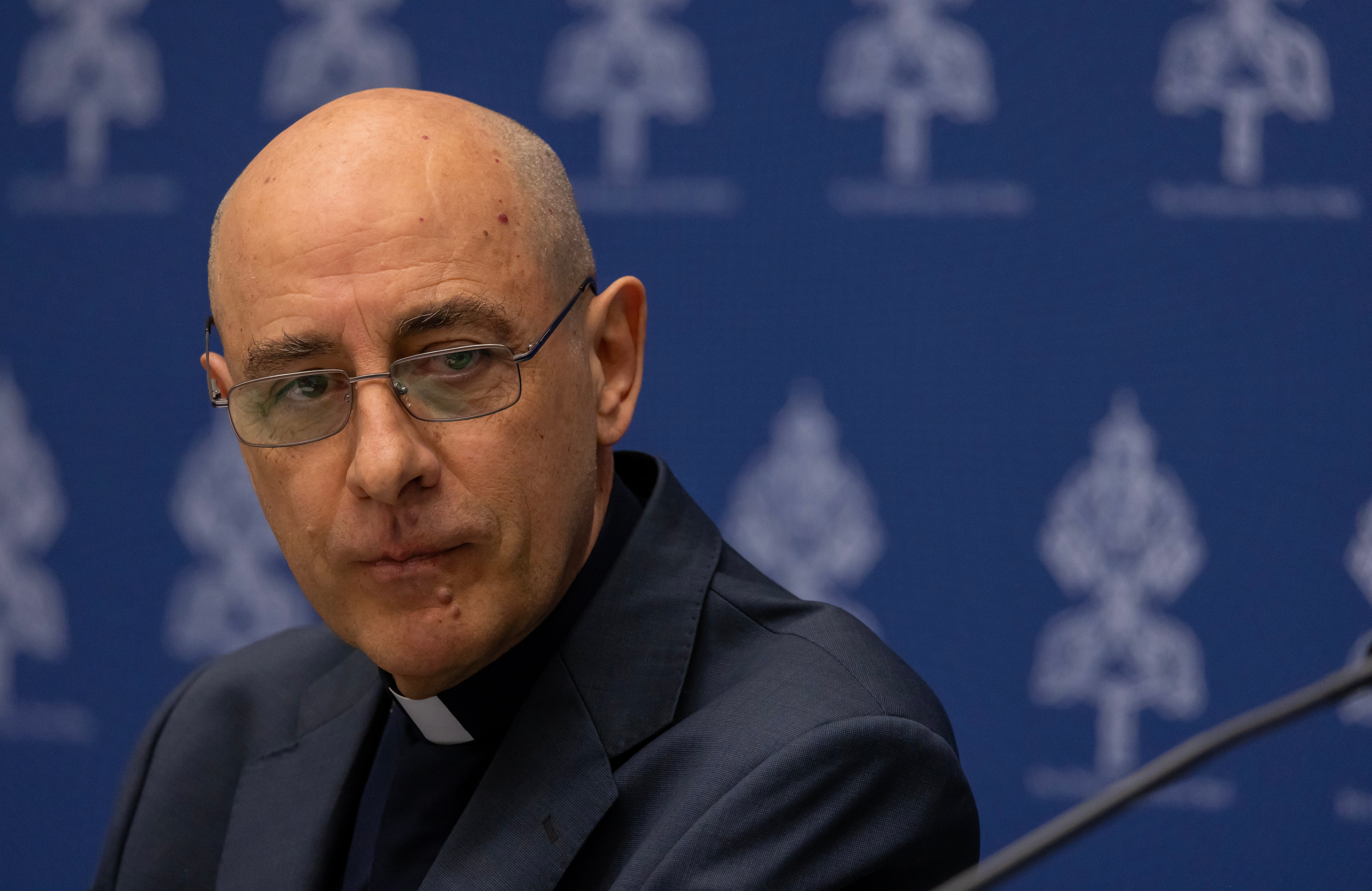 Cardinal Víctor Manuel Fernández speaks at a news conference.