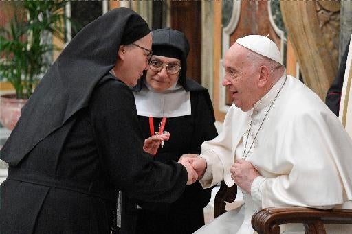 Pope Francis greets sisters