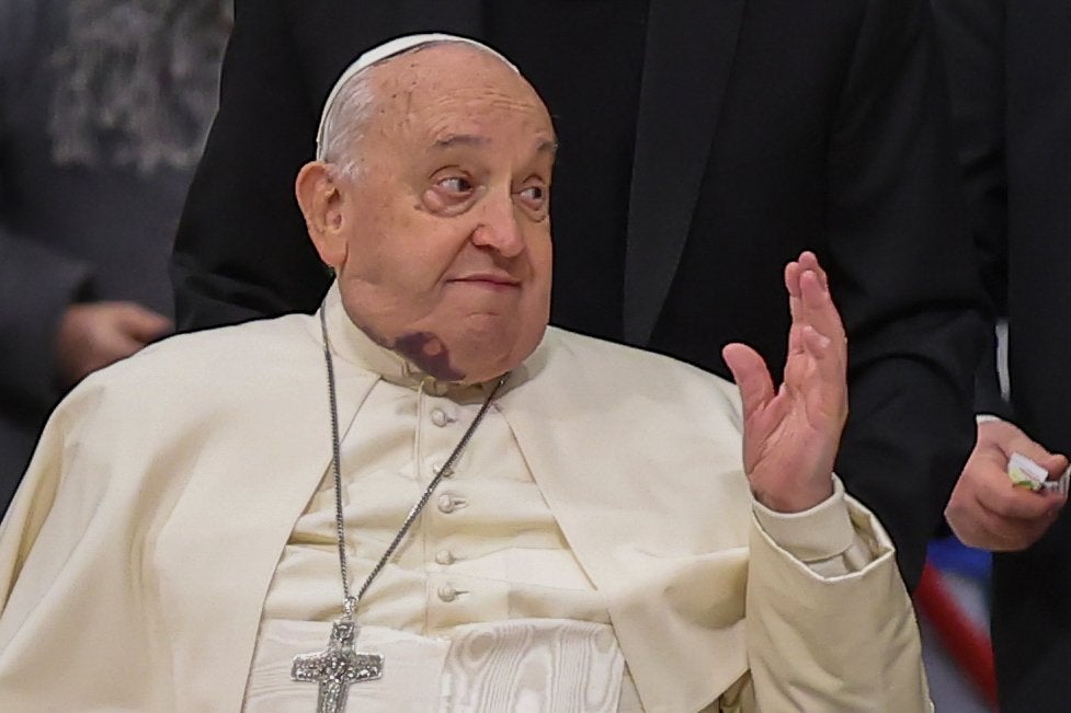 Pope Francis waves to people at consistory