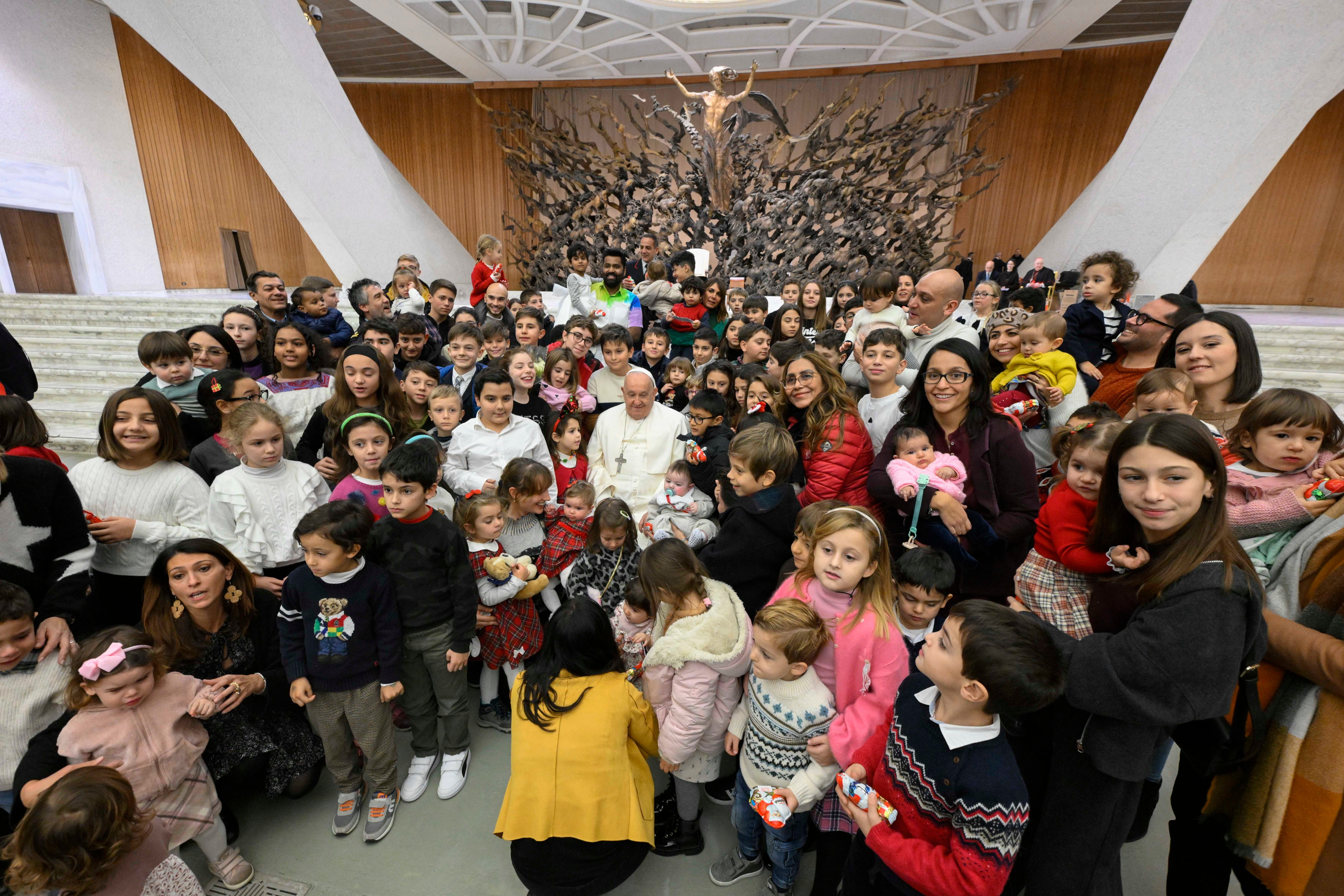 Pope Francis poses for photo with children of Vatican employees