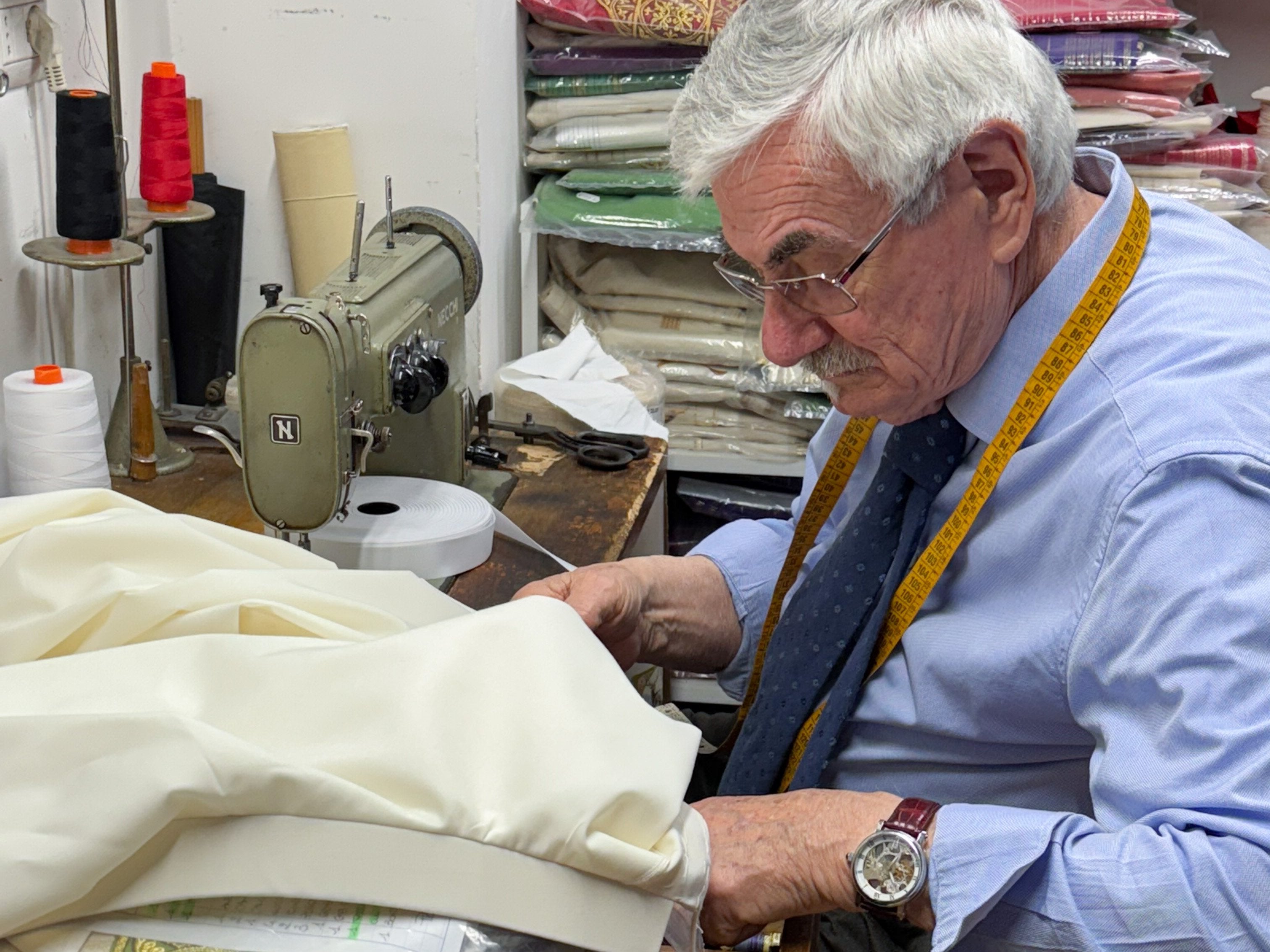 Raniero Mancinelli sews a cassock for the new pope