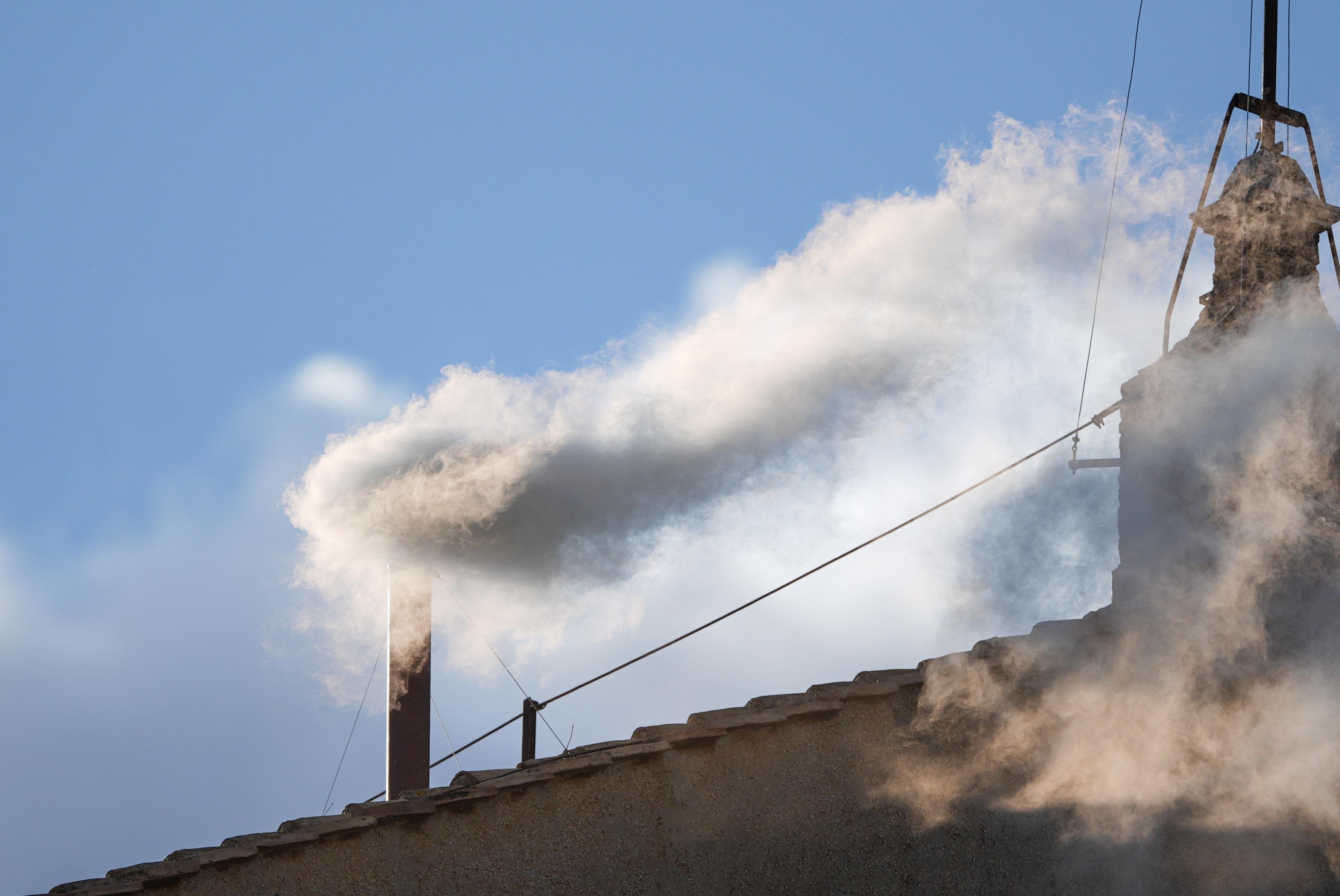 White smoke billows from Sistine Chapel chimney