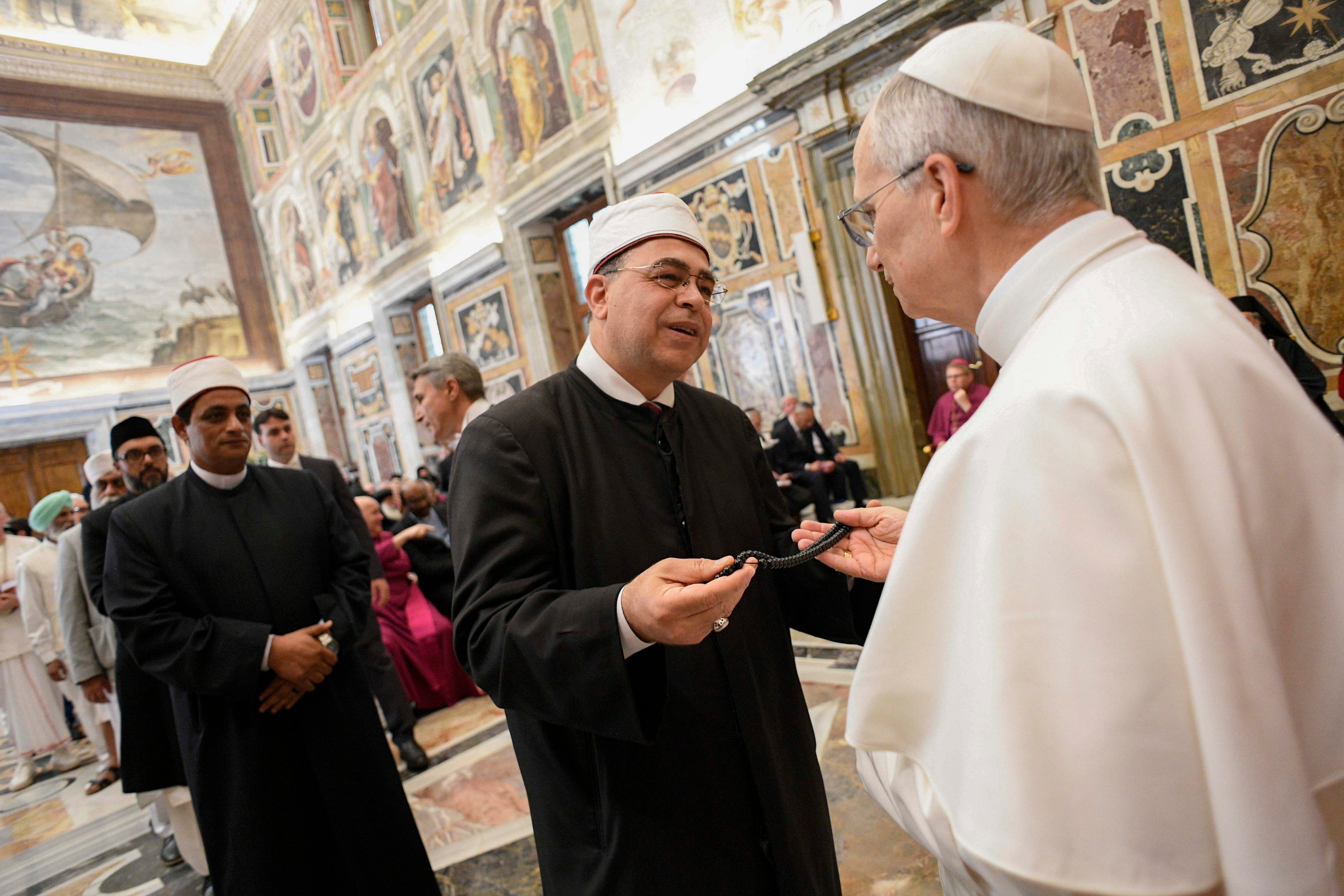 Pope Leo greets a Muslim leader