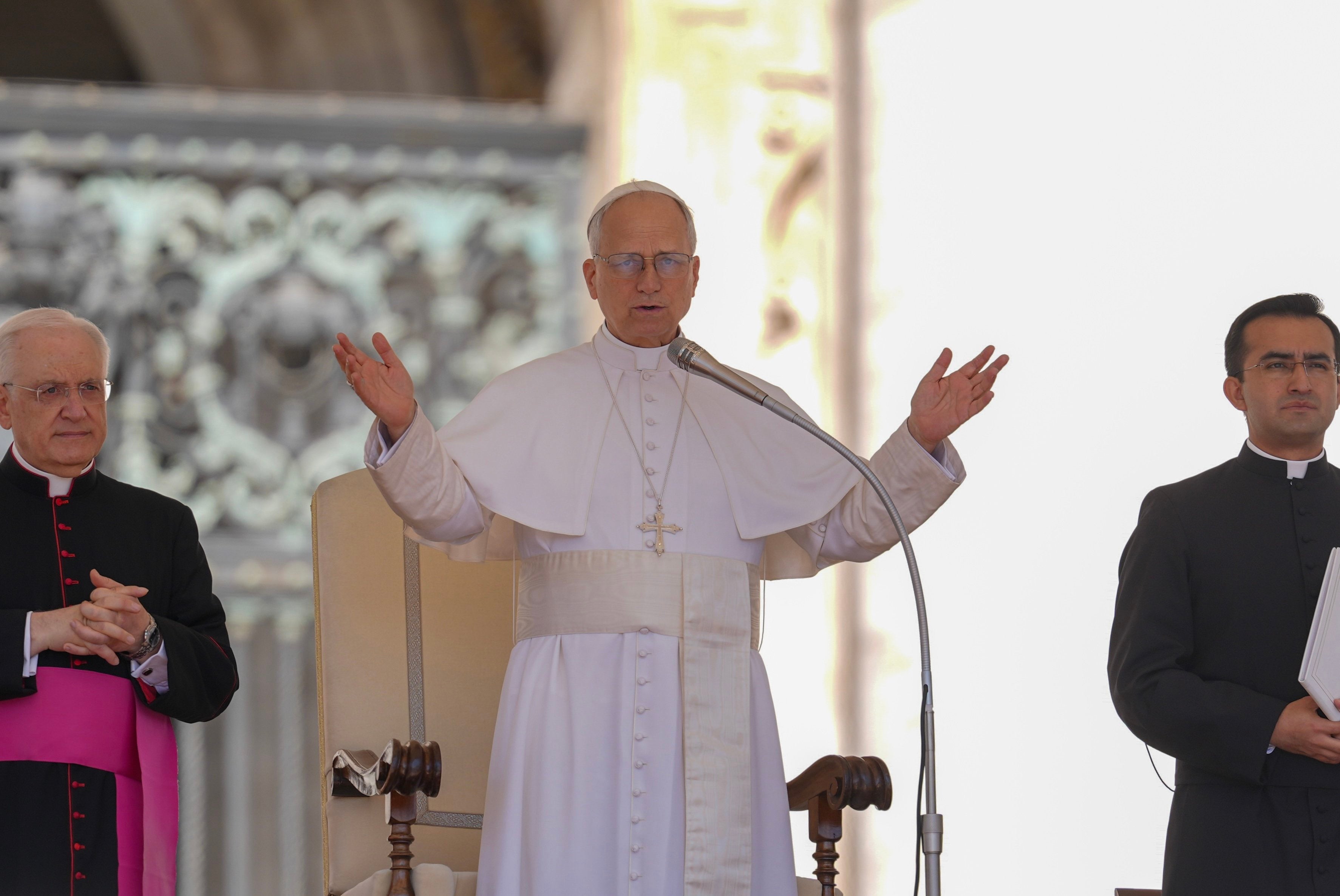 Pope Leo XIV leads prayers at the beginning of his general audience