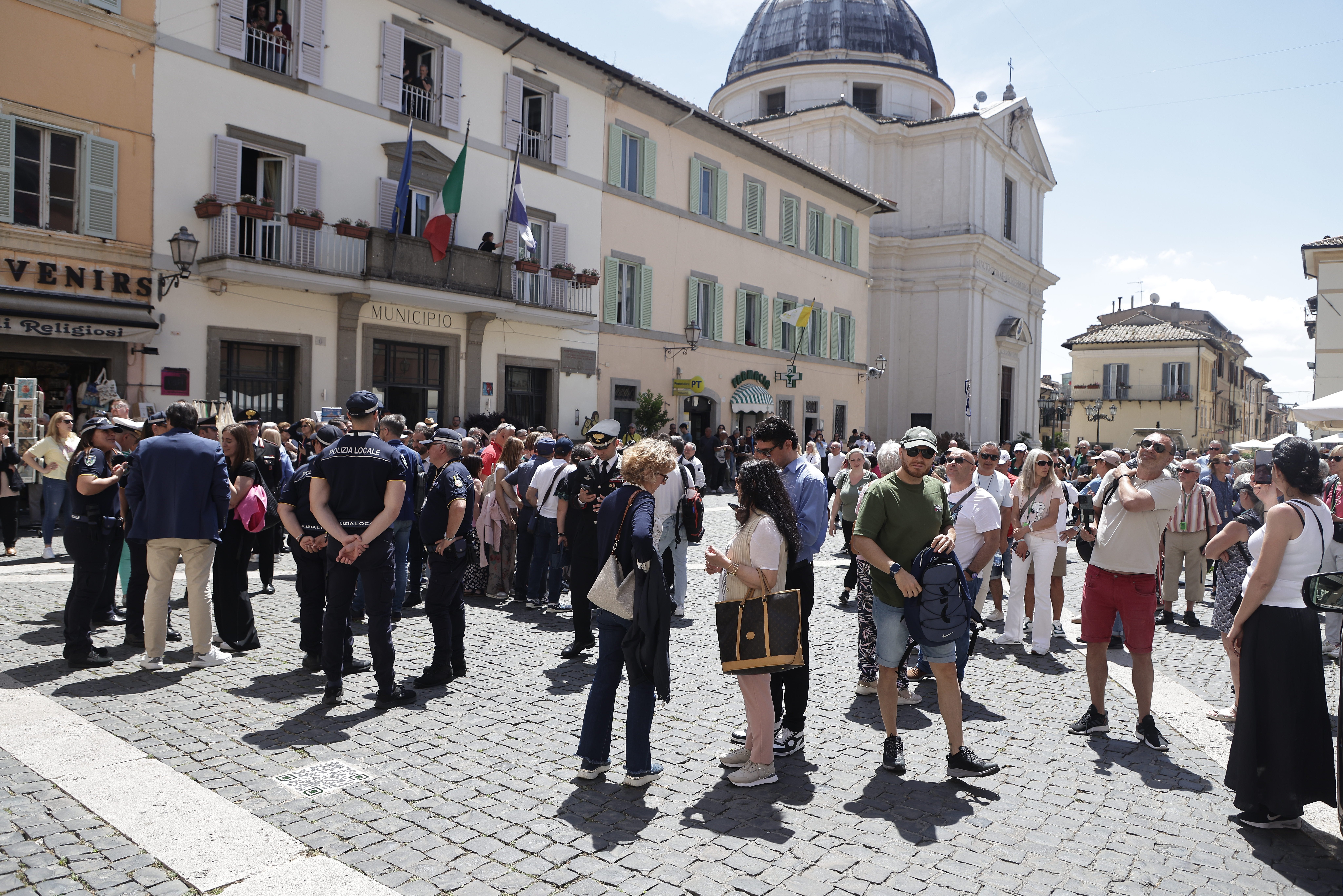 Tourists in the main square of Castel Gandolfo
