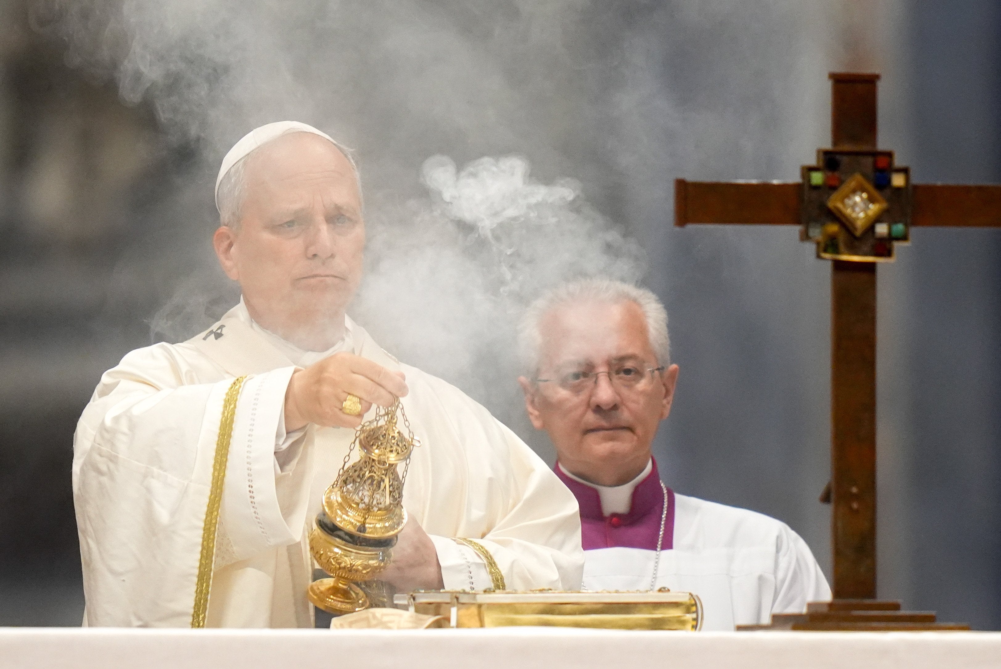 Pope Leo XIV uses incense at the altar.