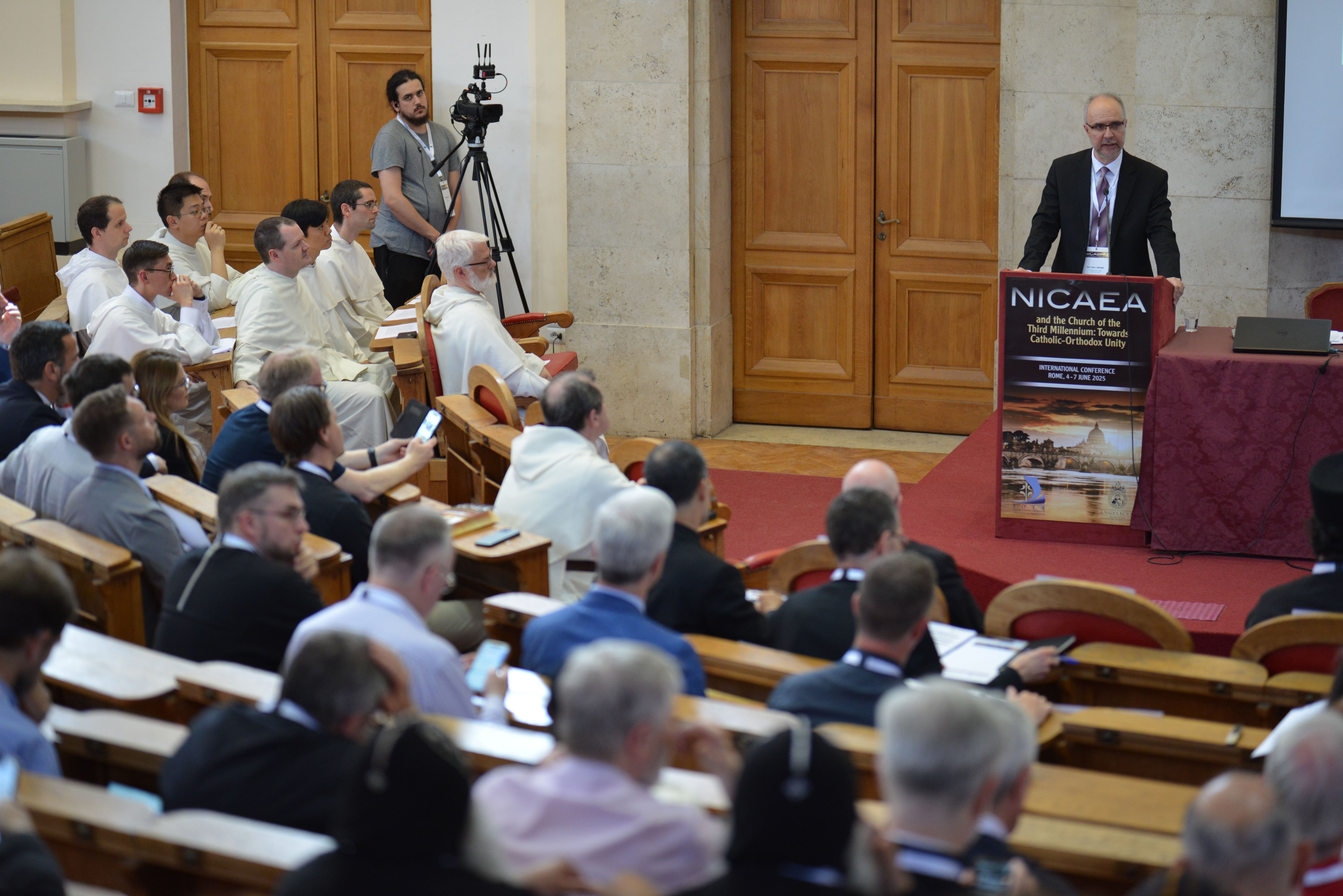 Paul L. Gavrilyuk speaks to Nicaea conference participants