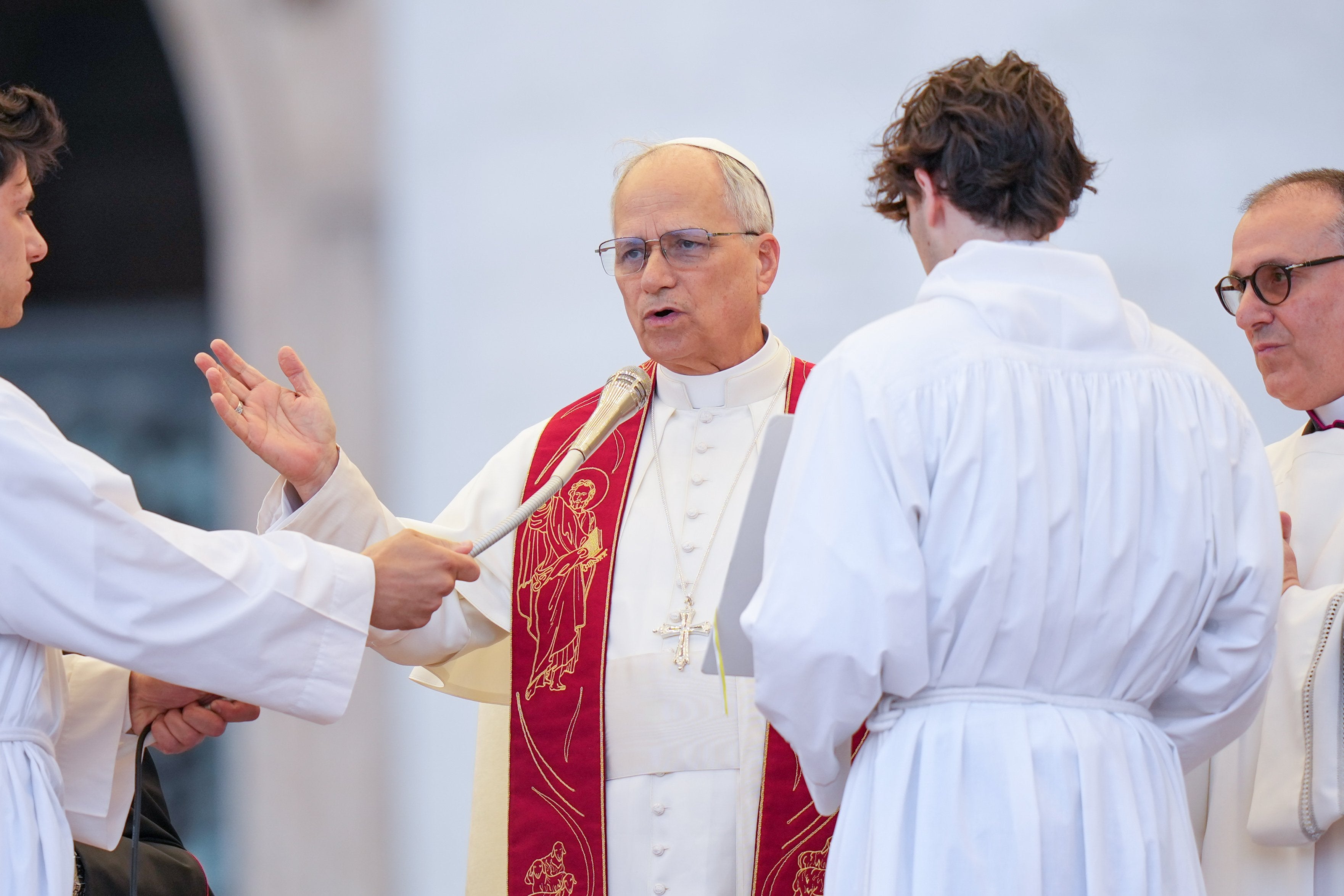 Pope Leo XIV prays at the beginning of a Pentecost vigil