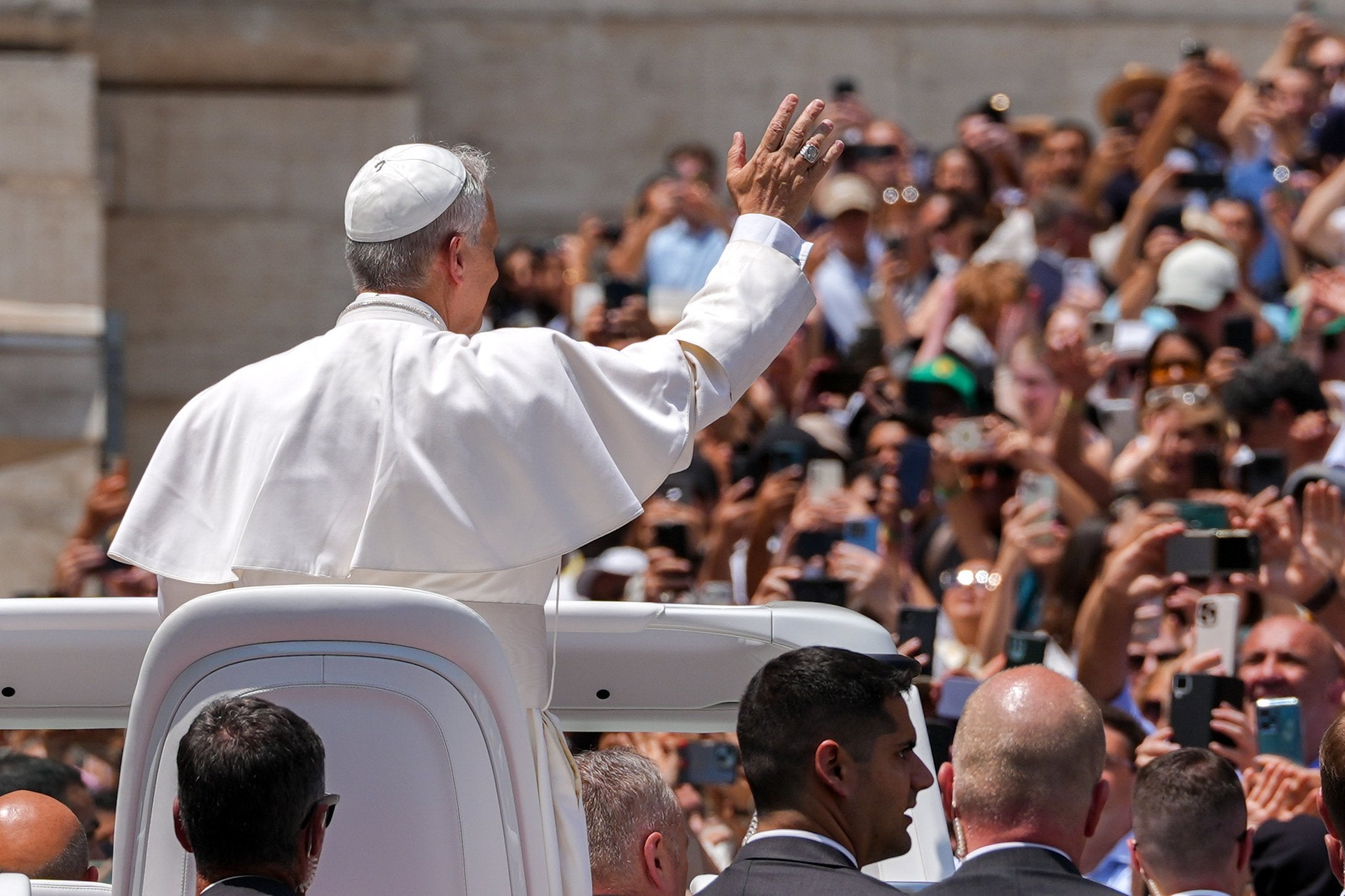 Pope Leo XIV waves goodbye after his general audience