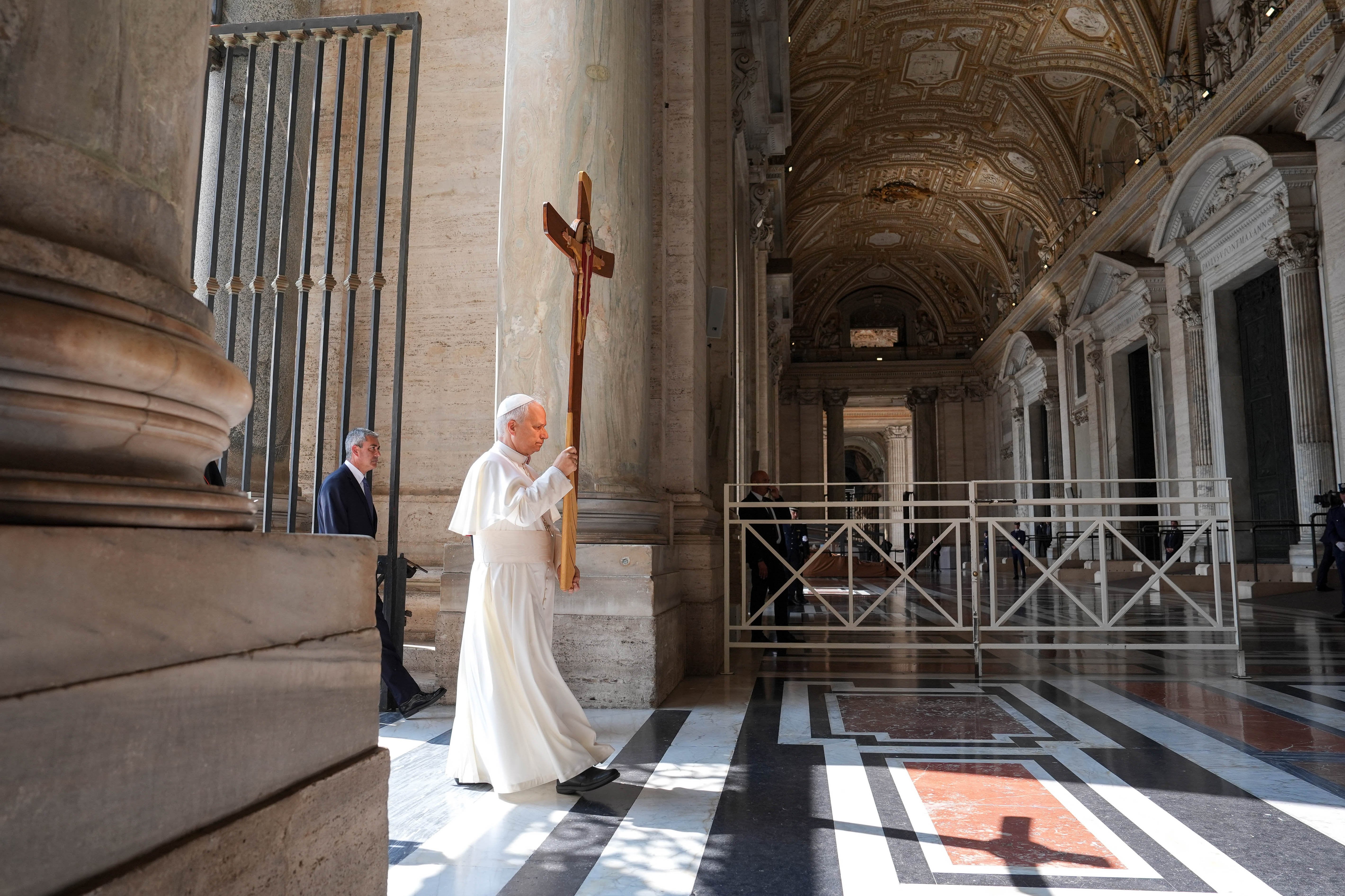 Pope Leo XIV leads a procession to the Holy Door of St. Peter's