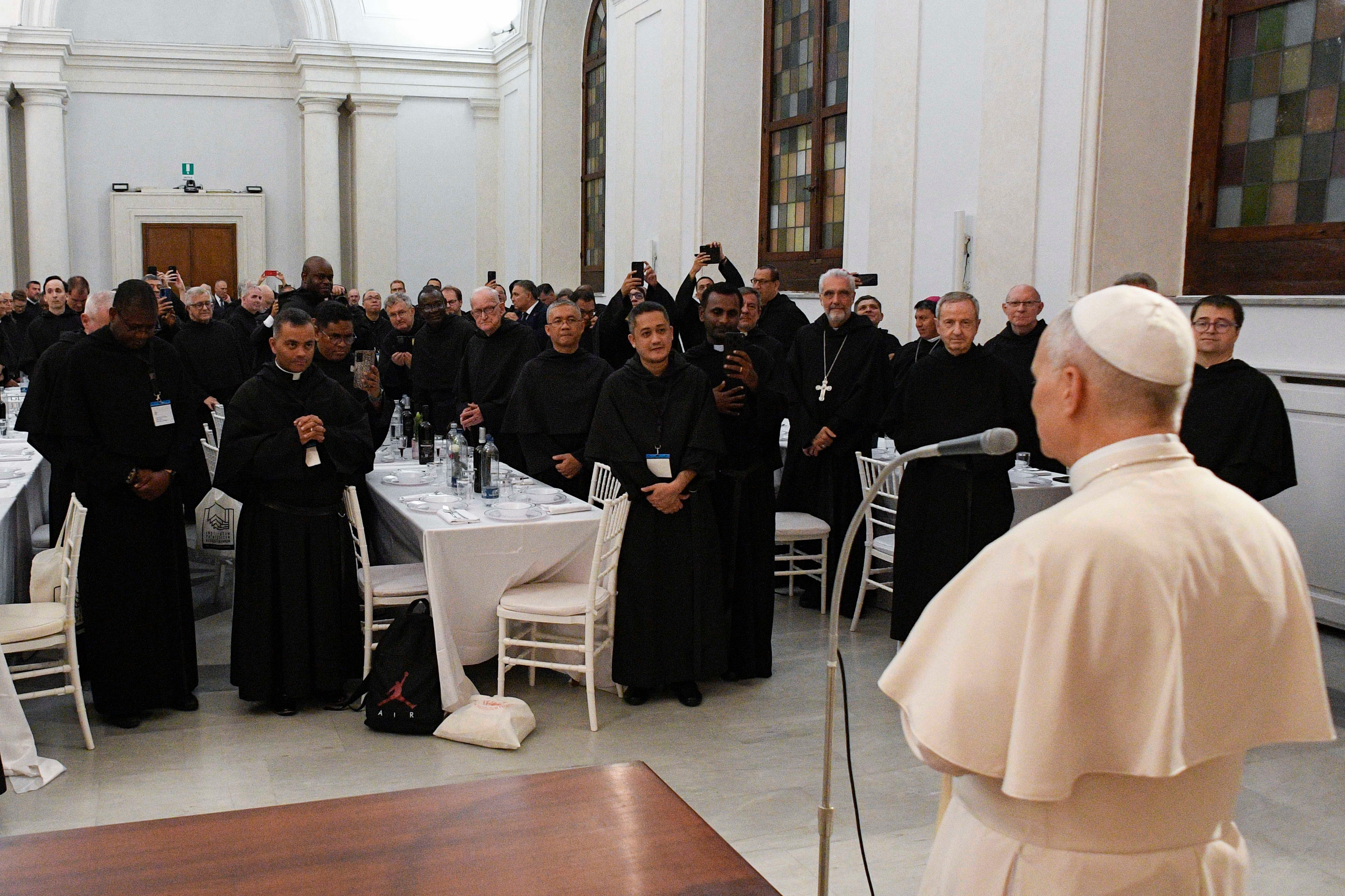 Pope Leo XIV blesses Augustinian friars before joining them for dinner