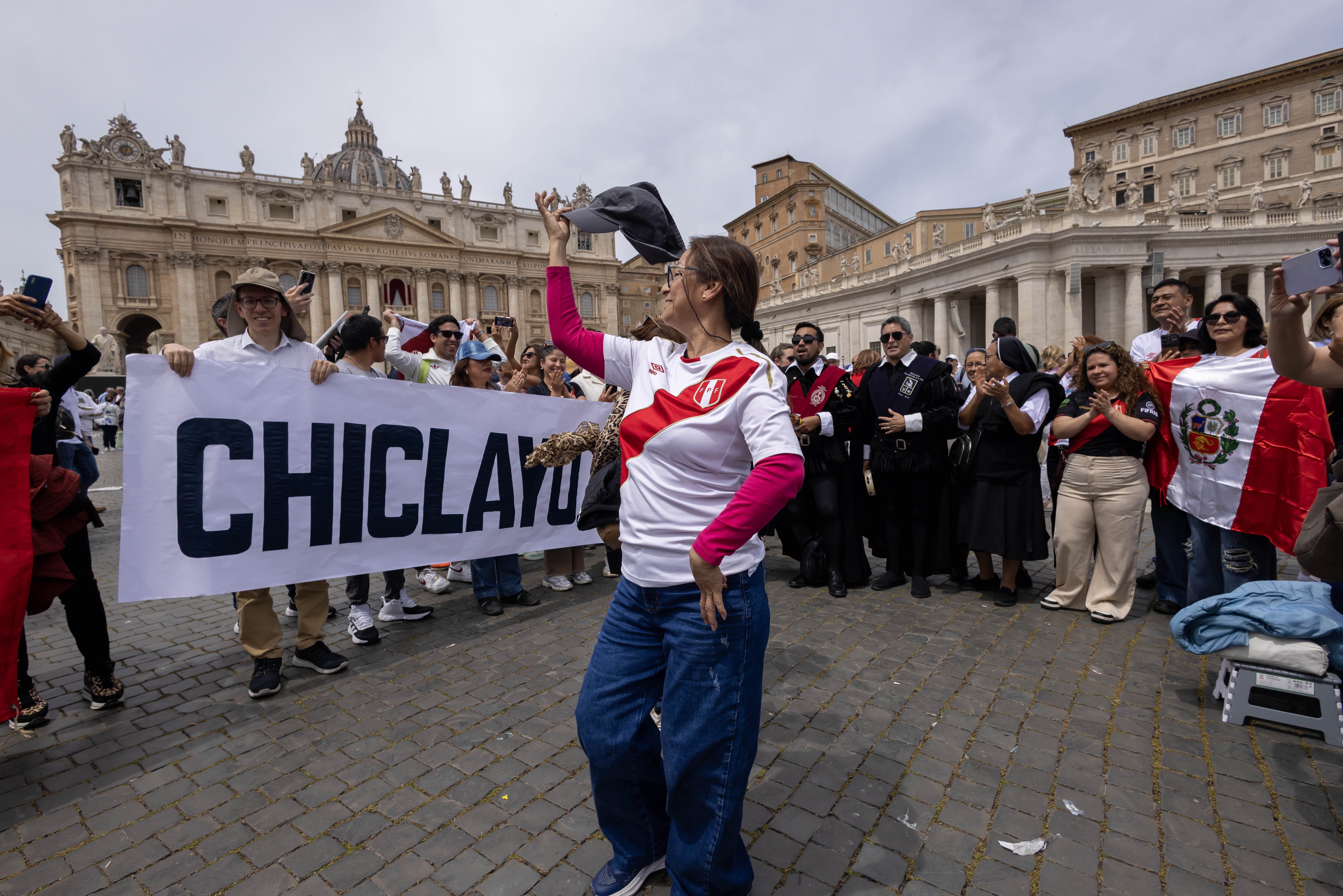 People from pope's old diocese in Peru celebrate in St. Peter's Square