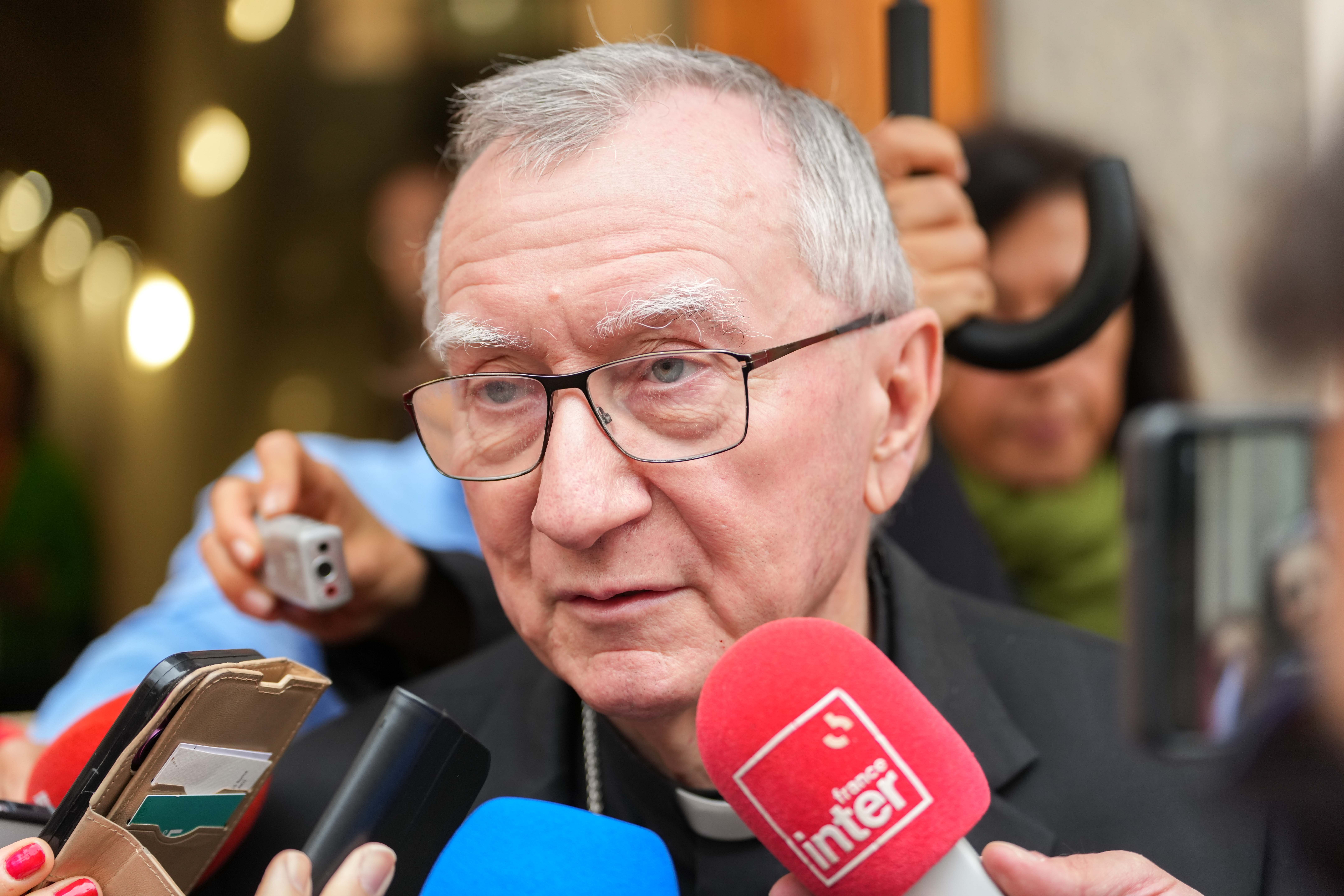 Cardinal Pietro Parolin speaks to reporters