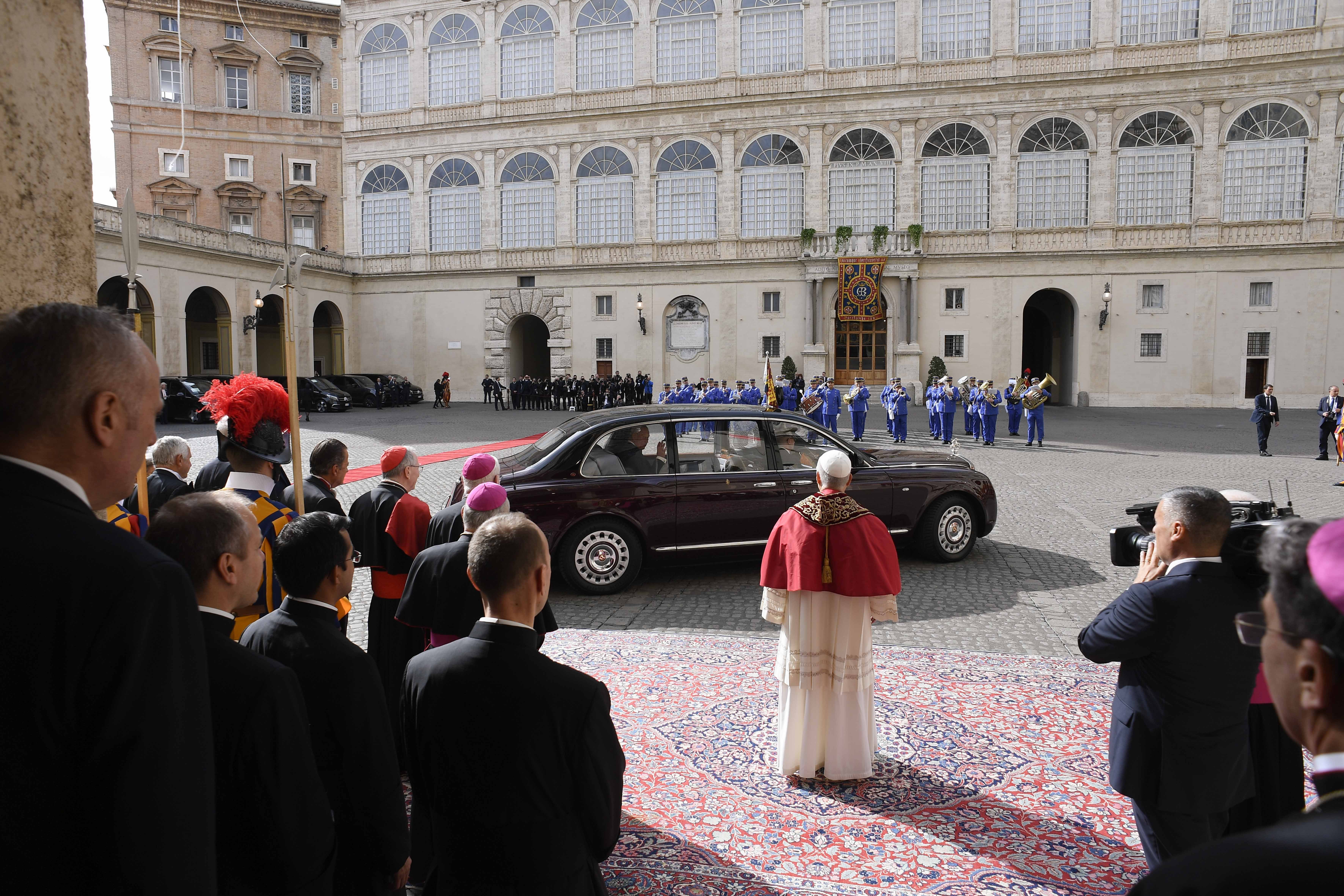 Pope Leo XIV watches King Charles leave the Vatican