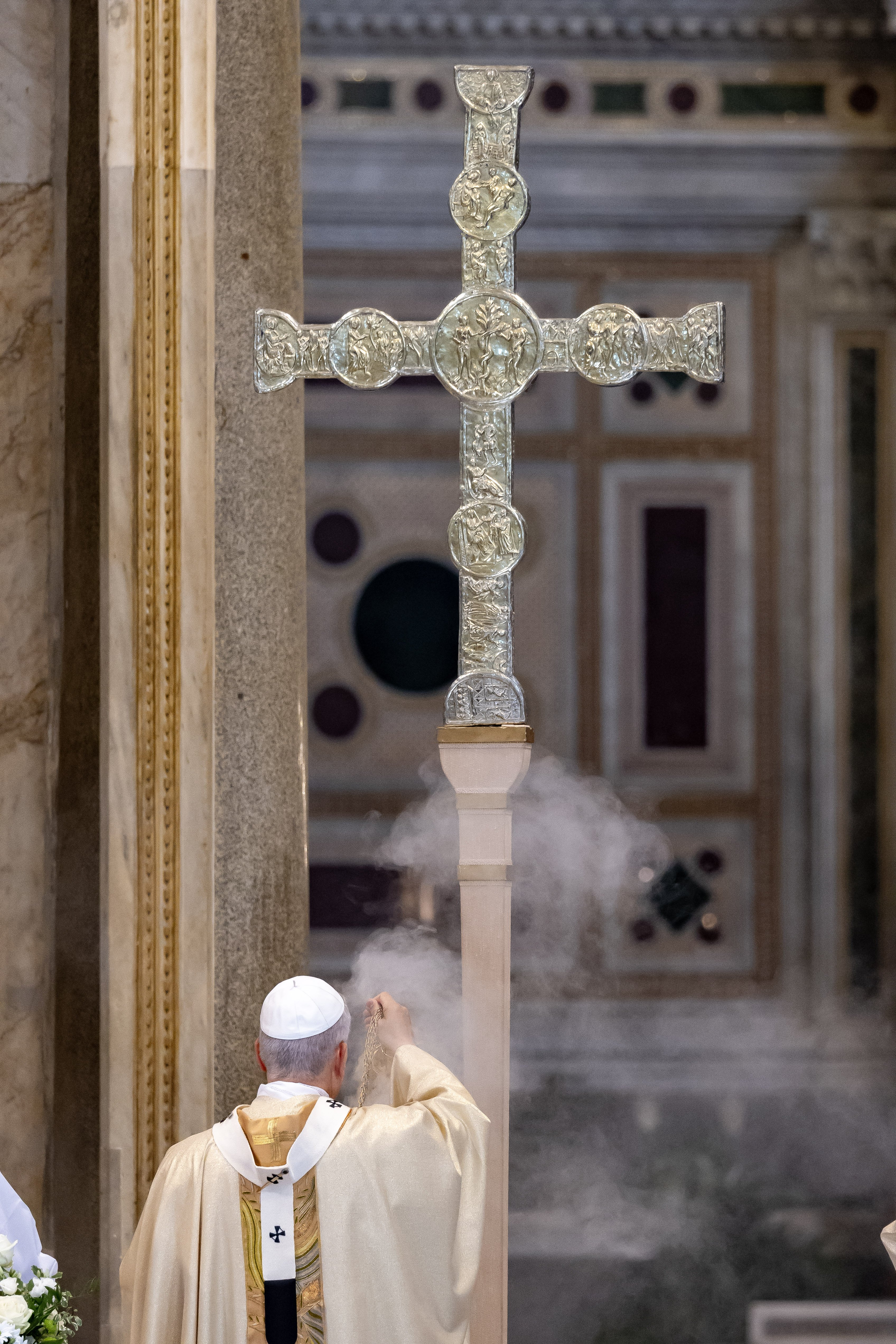 Pope Leo blesses a cross at the Basilica of St. John Lateran