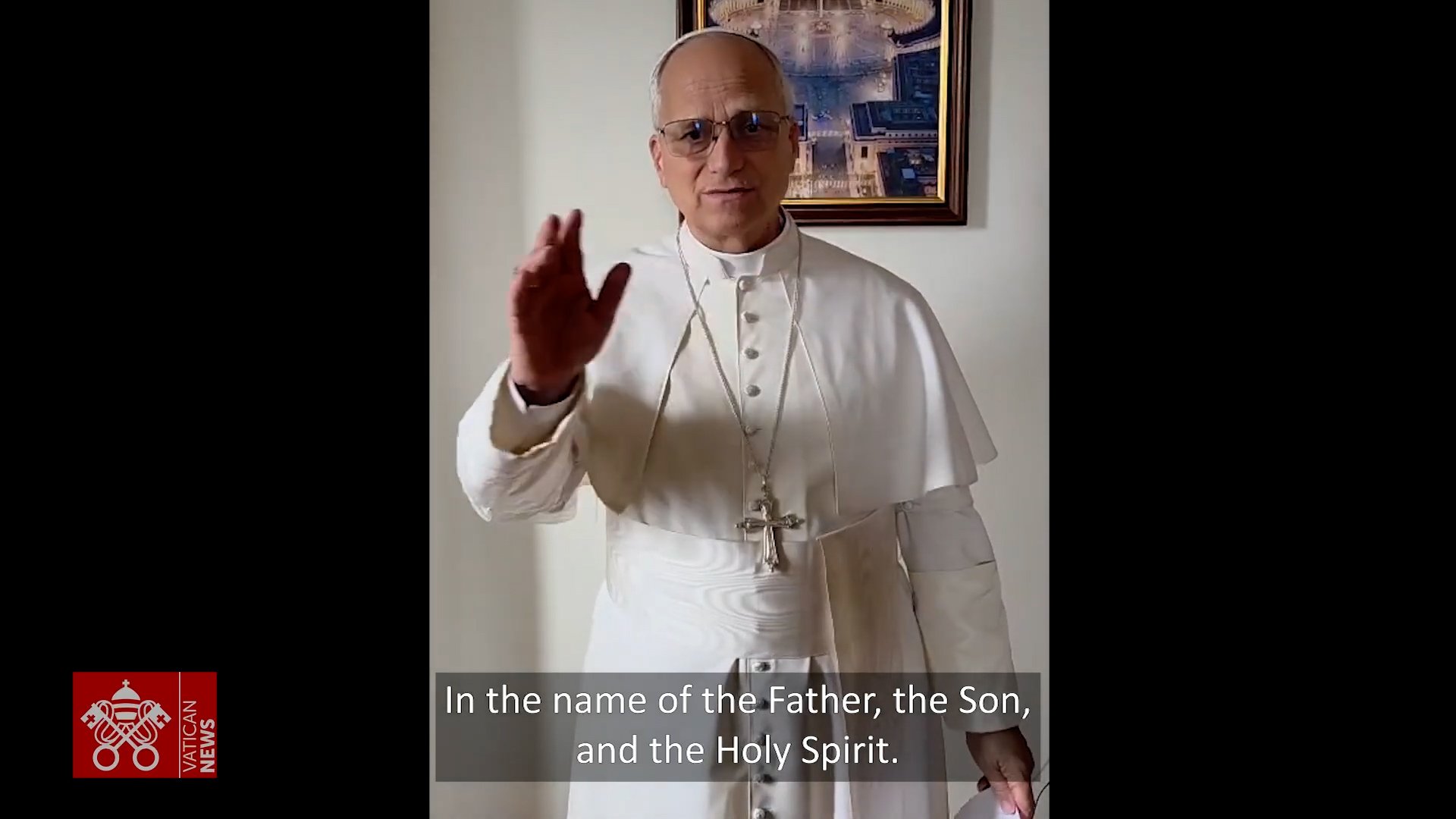 Pope Leo gives his blessing at the end of a video message