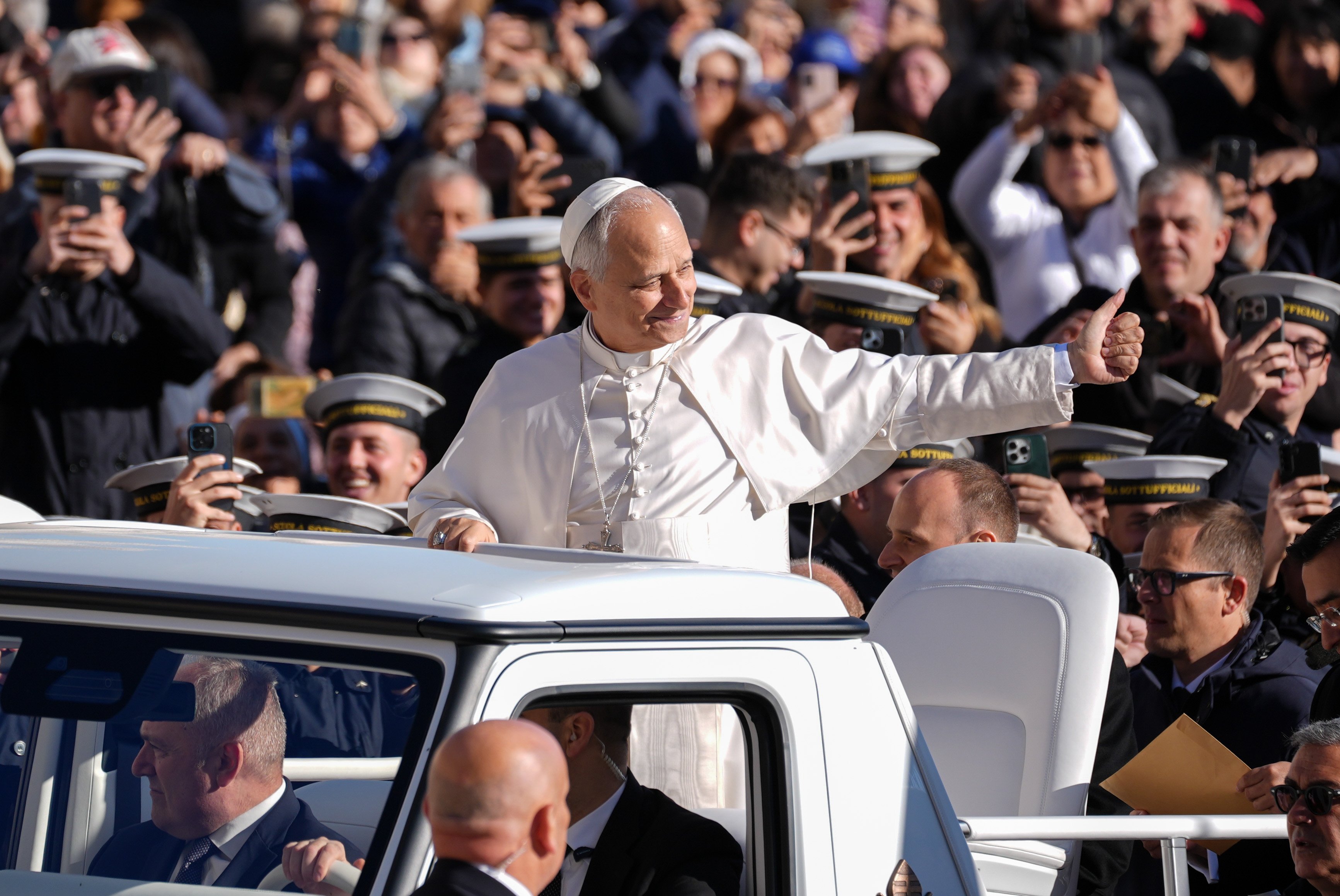 Pope Leo gives a thumbs up