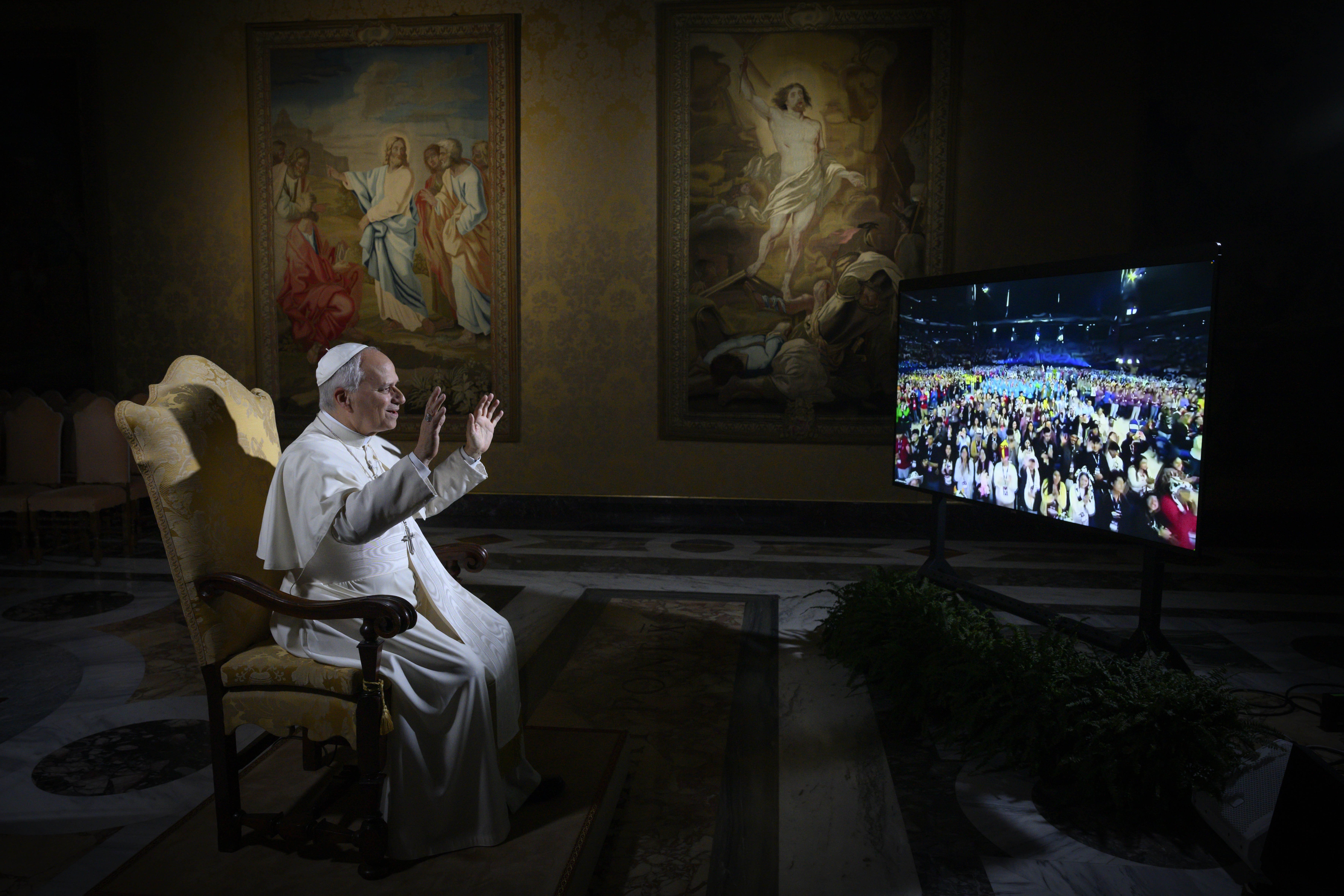 Pope Leo waves at U.S. teens during livestream