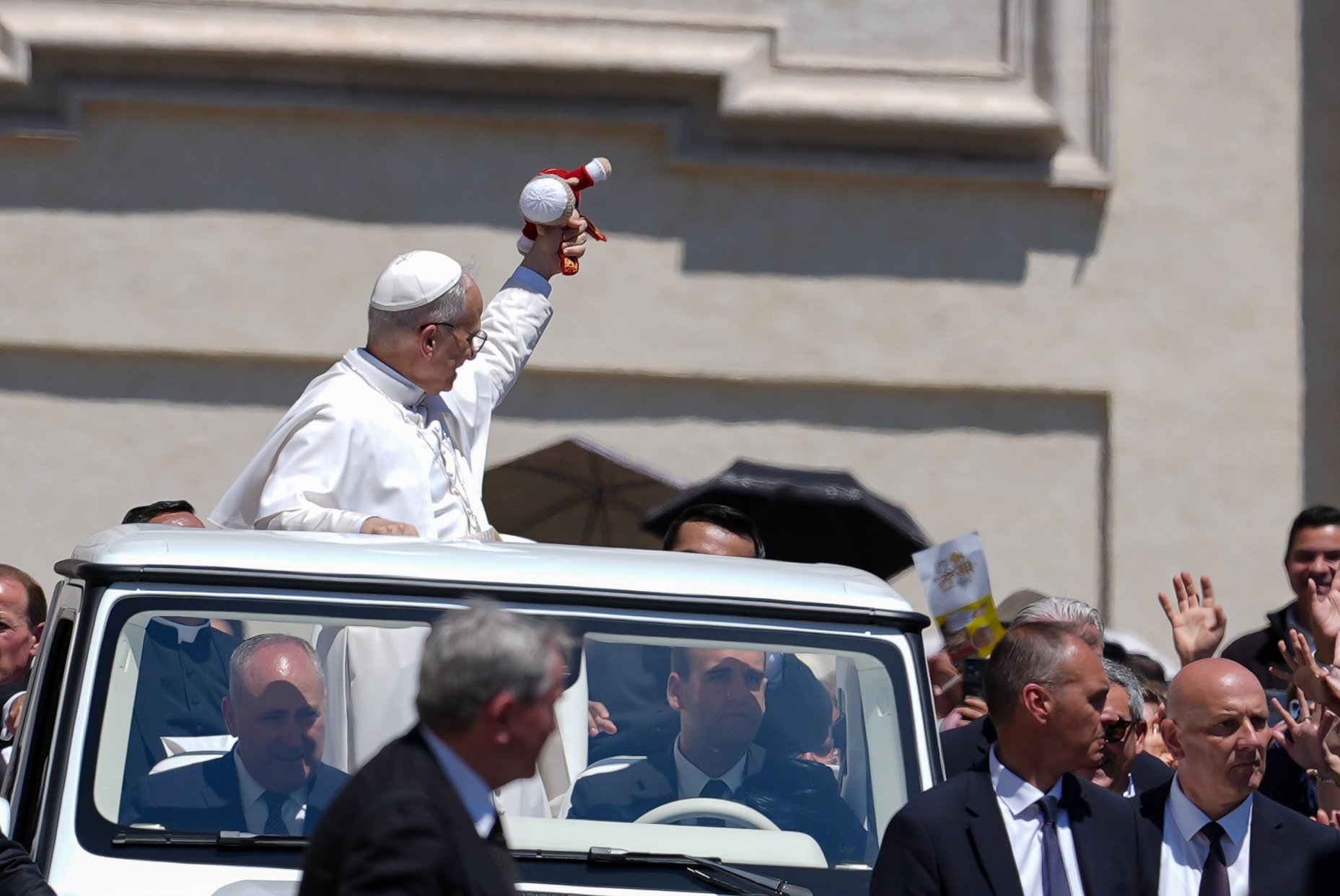 Pope Leo catches a doll at his general audience