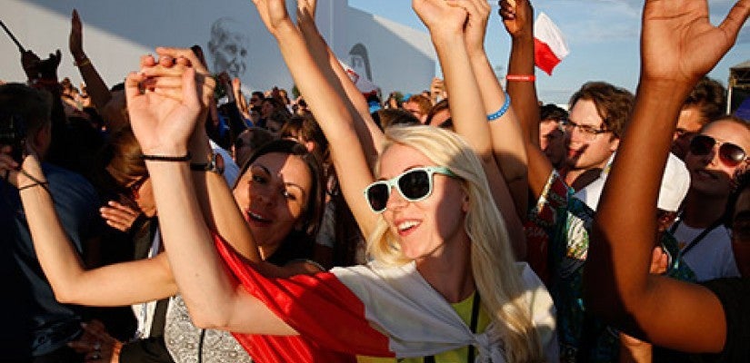 World Youth Day pilgrims cheer as Pope Francis leads the July 30 prayer vigil at the Field of Mercy in Krakow, Poland. (CNS photo/Paul Haring)