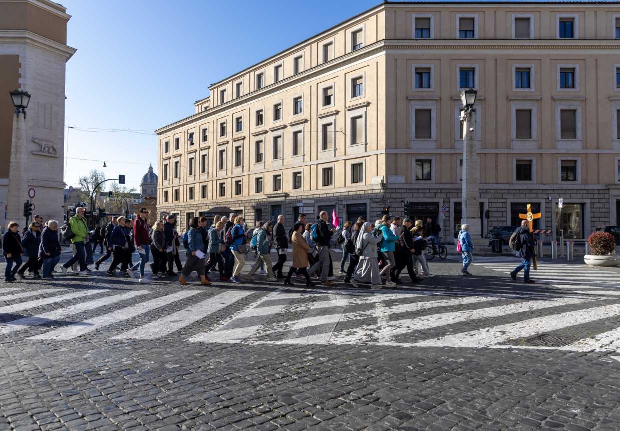 Pilgrims in Rome process along Via della Conciliazione, the boulevard that leads to St. Peter's Square.