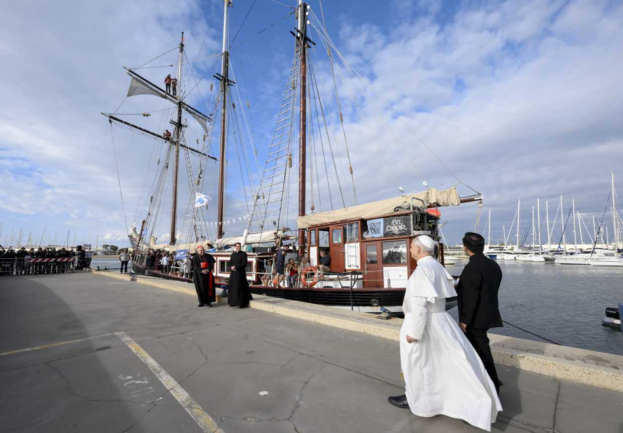 Pope Leo XIV approaches the Bel Espoir sailboat in Ostia