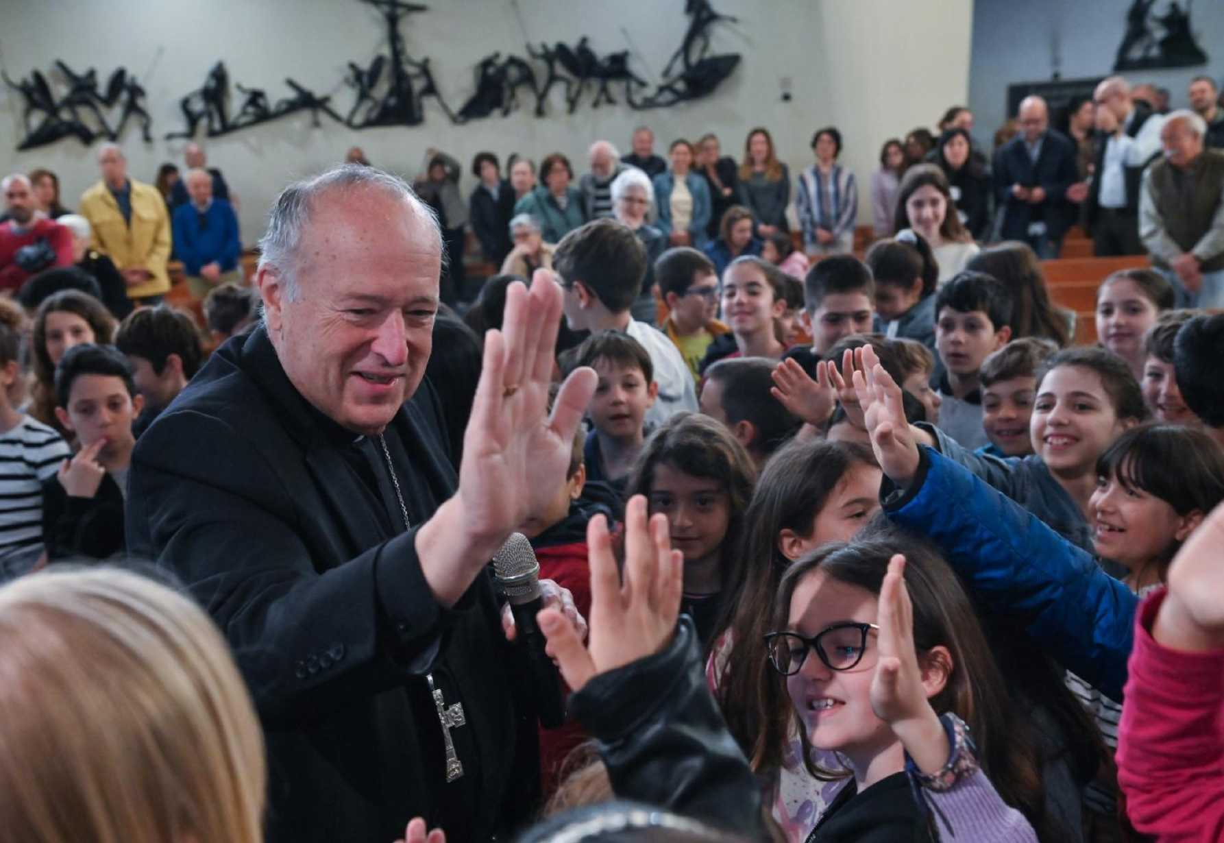 Cardinal McElroy formalizes bond with Rome parish with Mass, high-fives